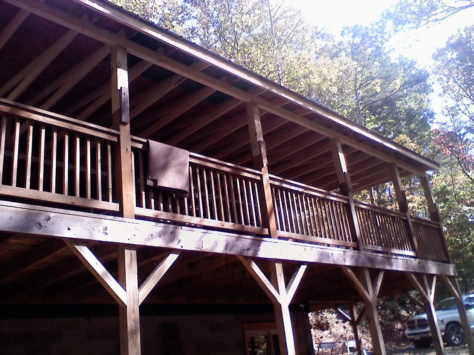 Timber framing under a new elevated porch and deck — Roof Leak Repair in Waunakee by Roofing Brothers